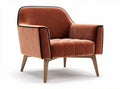 Velvet upholstered armchair with wooden legs and tufted design in orange